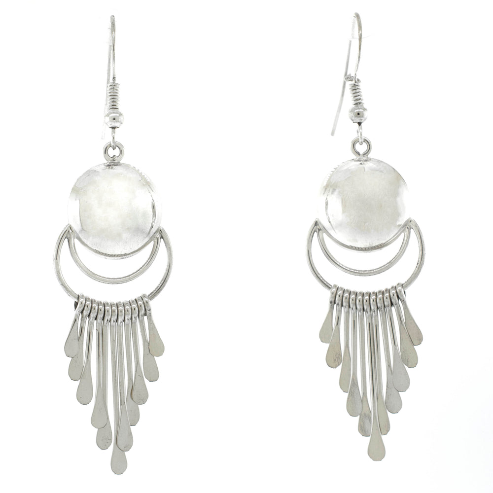 
                  
                    A pair of Stunning Navajo Chandelier Earrings by Super Silver with a white stone.
                  
                