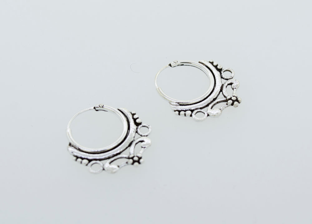 
                  
                    Small Silver Hoop Earrings With Beautiful Swirl Filigree Design
                  
                