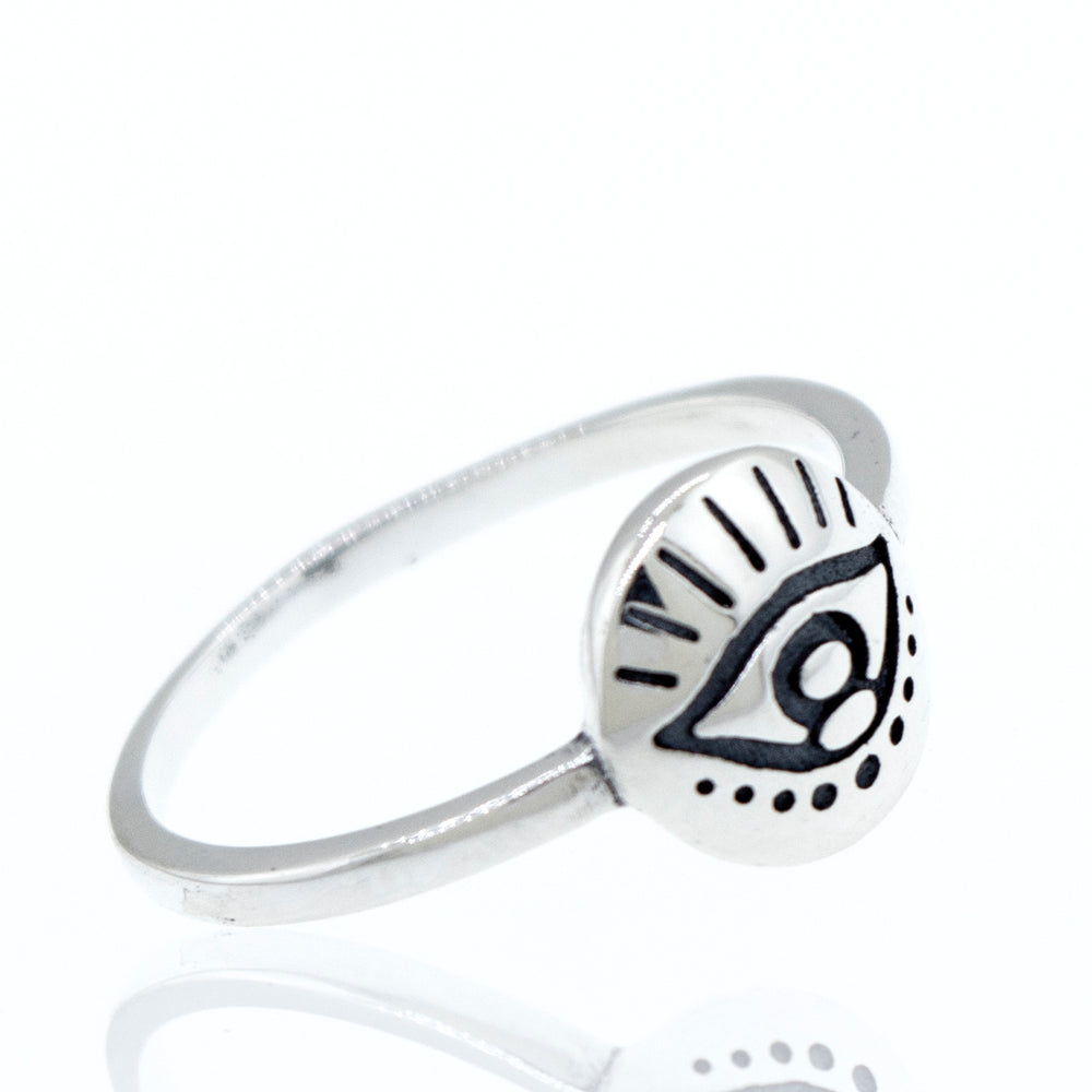 
                  
                    A minimalist silver All Seeing Evil Eye Ring with an eye on it.
                  
                