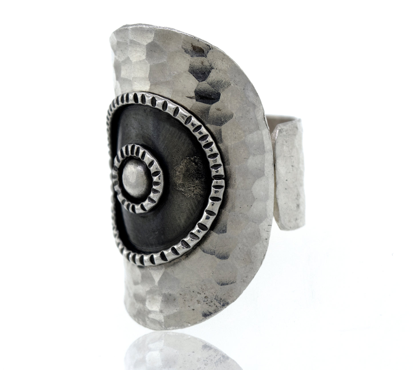 An adjustable Super Silver sterling silver ring with an oxidized bull's eye design.