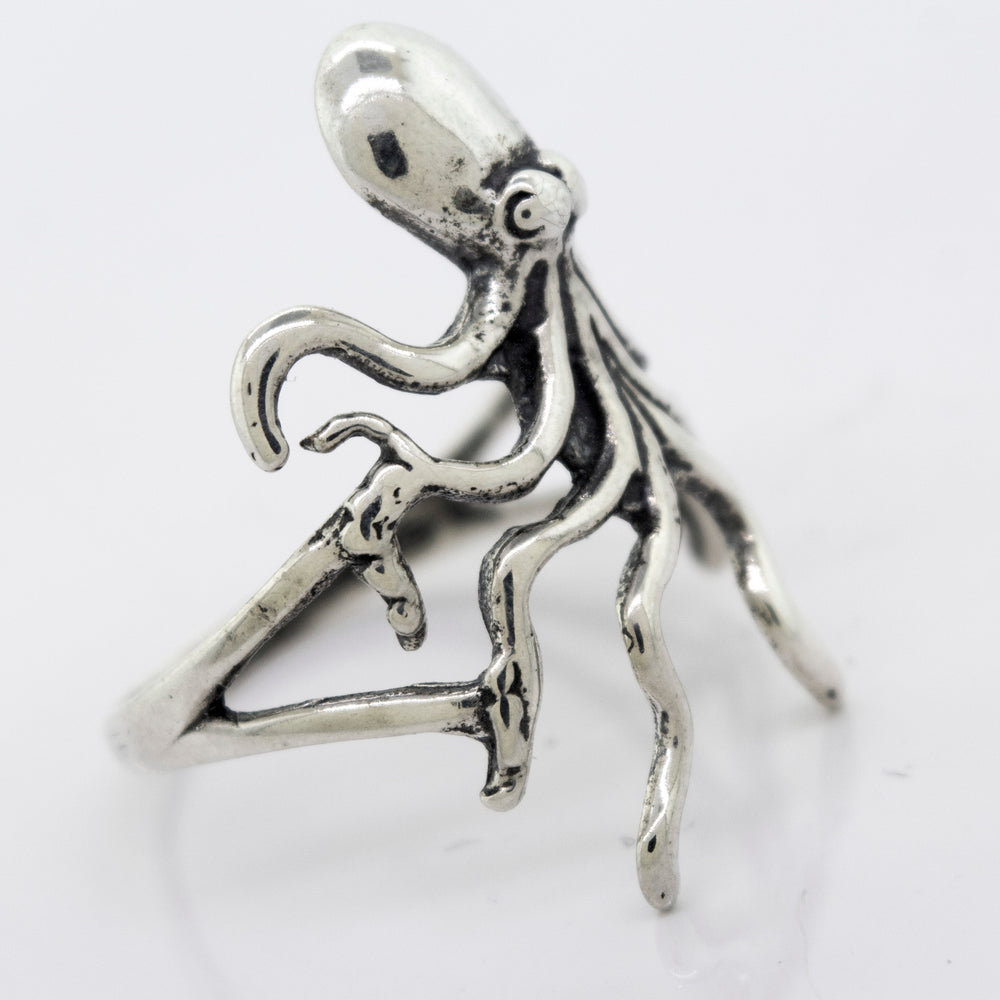 
                  
                    A Super Silver American Made Octopus Ring in the shape of an octopus on a white surface.
                  
                