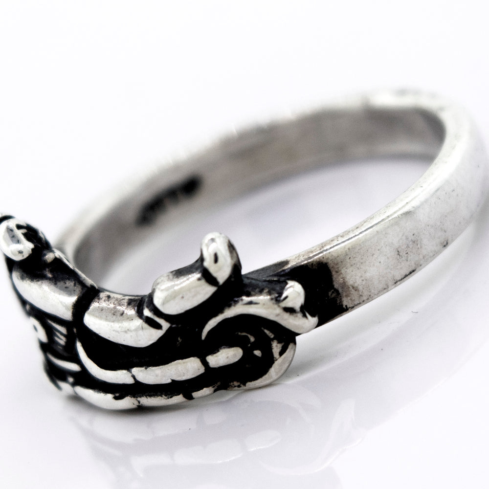
                  
                    A handcrafted Super Silver American Made Motorcycle Ring with a skull and crossbones.
                  
                