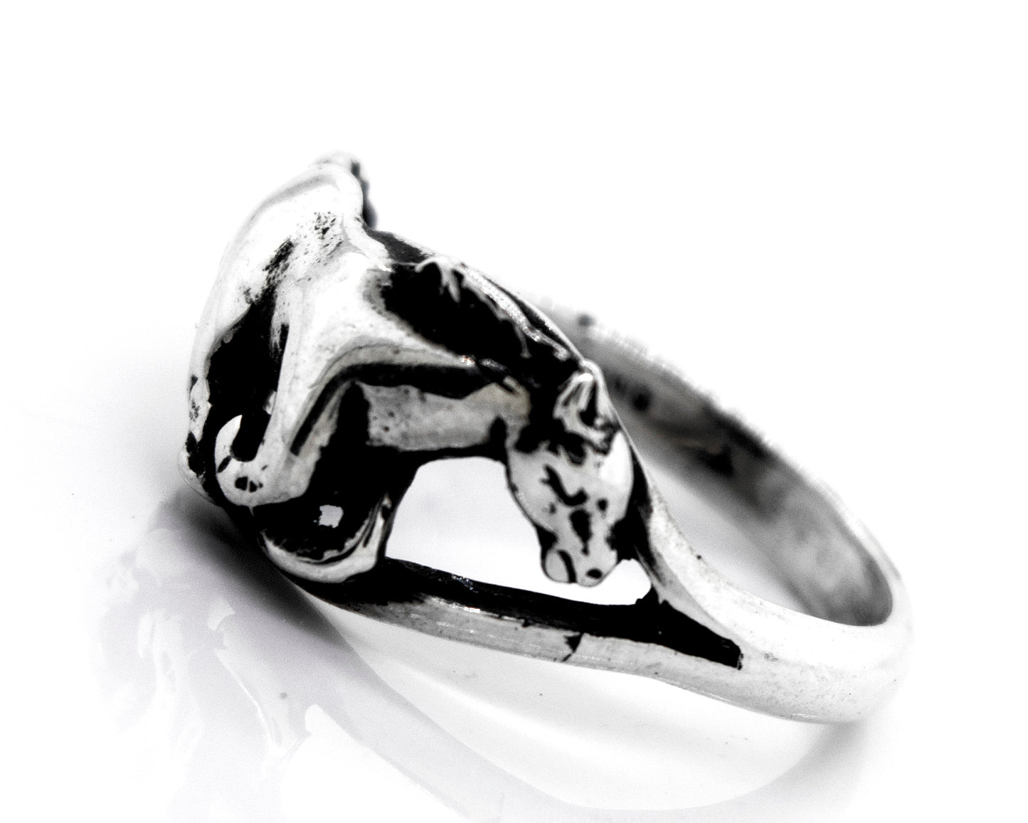 A Super Silver American Made Horse Ring with a sterling silver band and horse design.