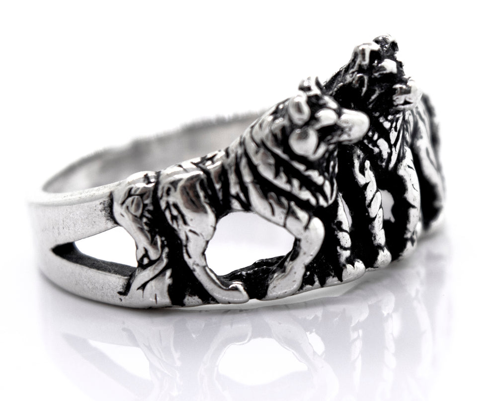 A handcrafted American Made Wolf Ring with three lions on it from Super Silver.