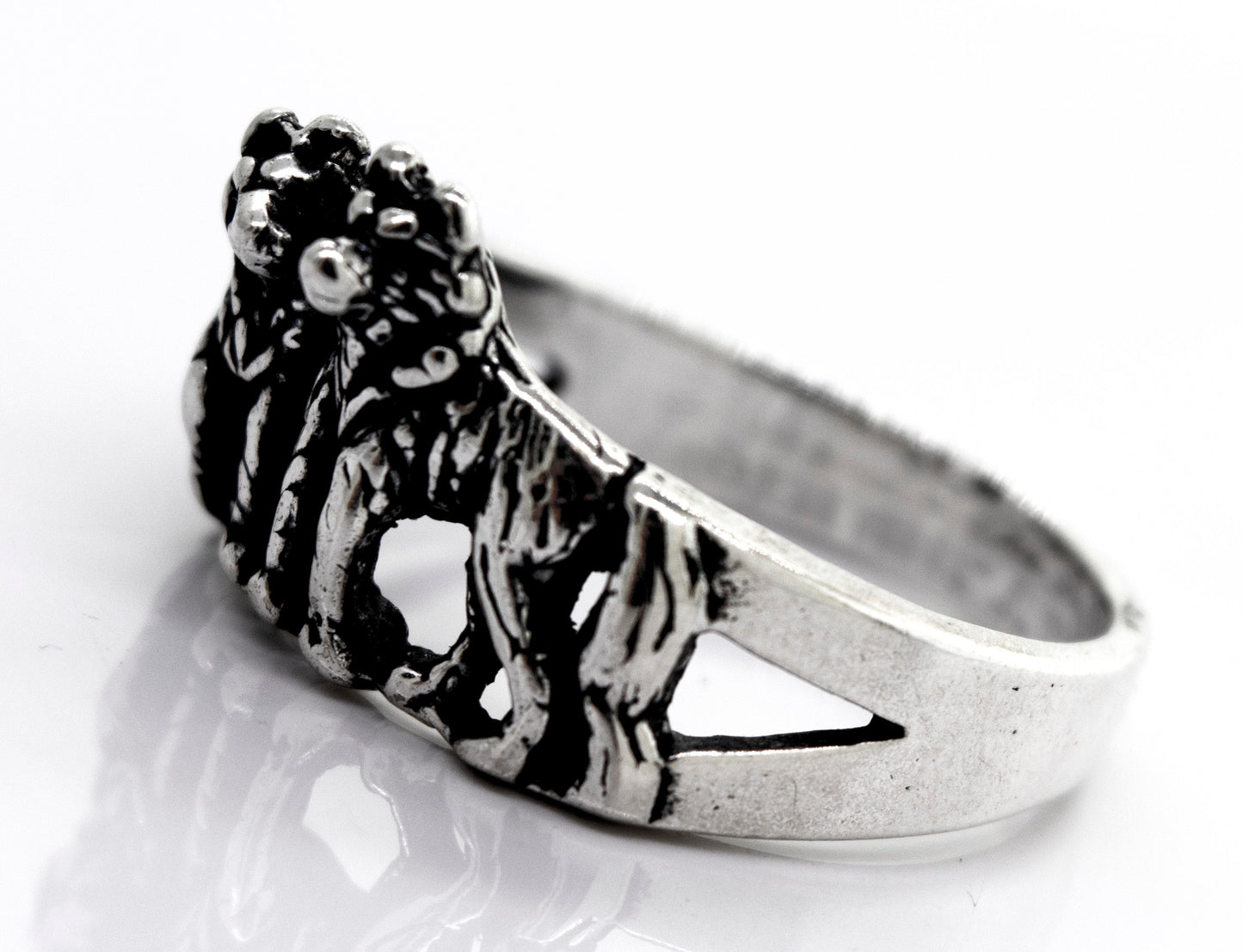 
                  
                    A handcrafted American Made Wolf Ring with two lions on it. (Brand Name: Super Silver)
                  
                