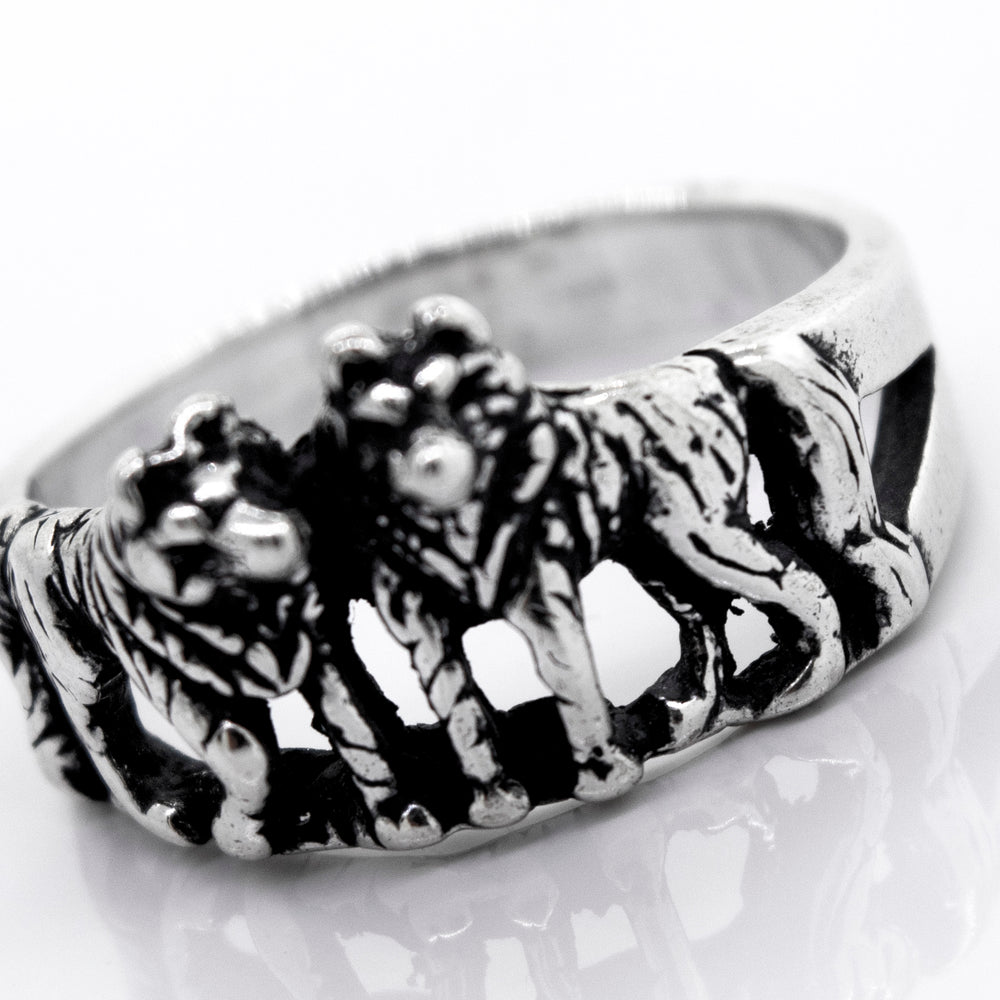 
                  
                    The Super Silver American Made Wolf Ring features three wolves elegantly engraved on it.
                  
                