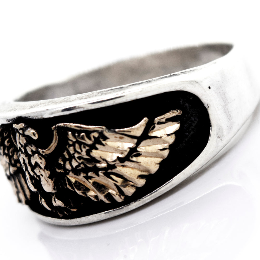 
                  
                    A Super Silver silver band with a American Made Heavy Eagle Ring With Bronze design, handcrafted in America.
                  
                