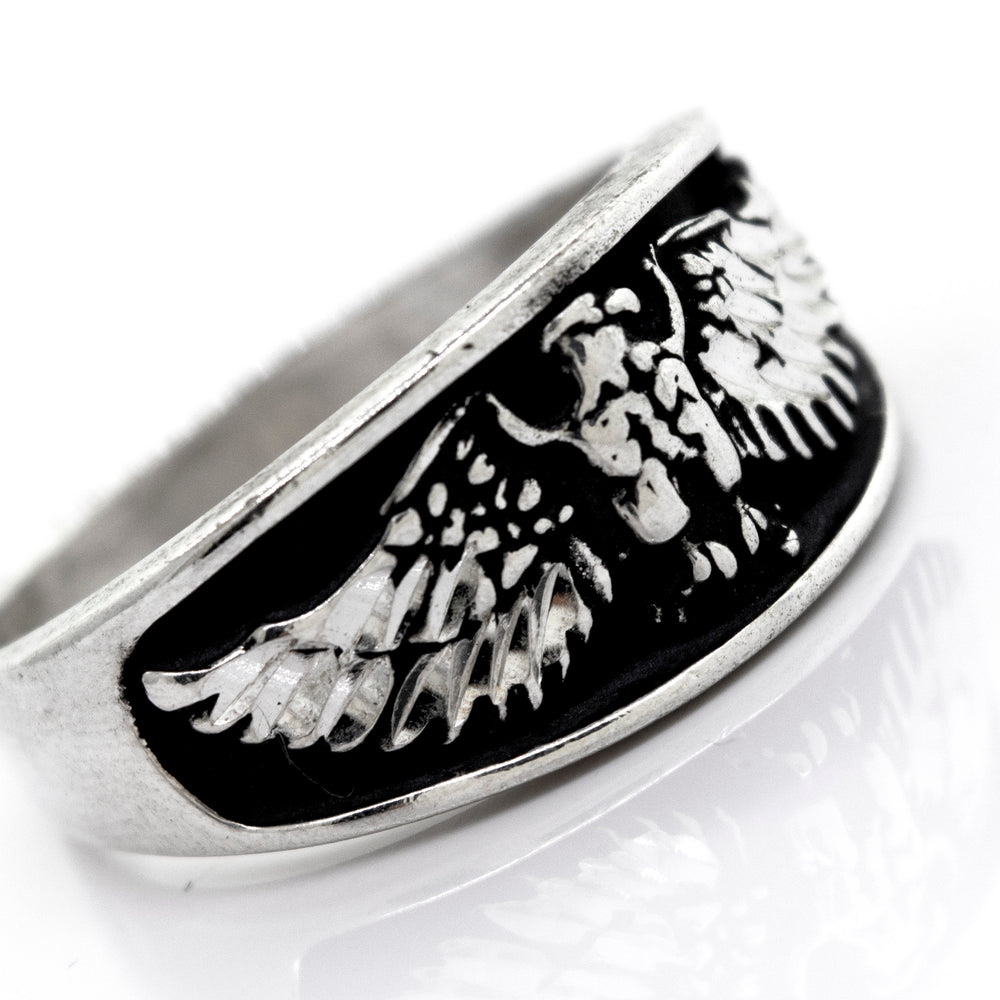 A handcrafted Super Silver American Made Heavy Eagle Ring with an eagle design.