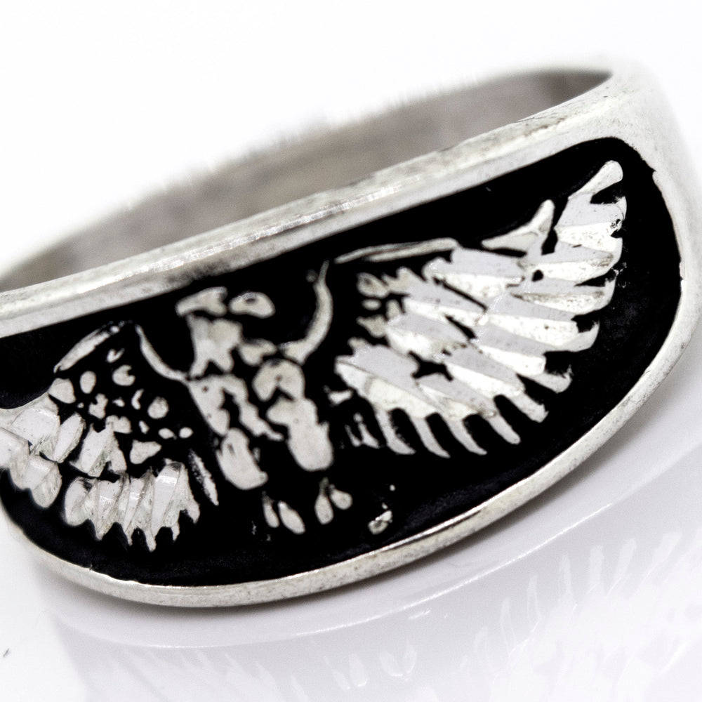 A Super Silver handcrafted American Made Heavy Eagle Ring.