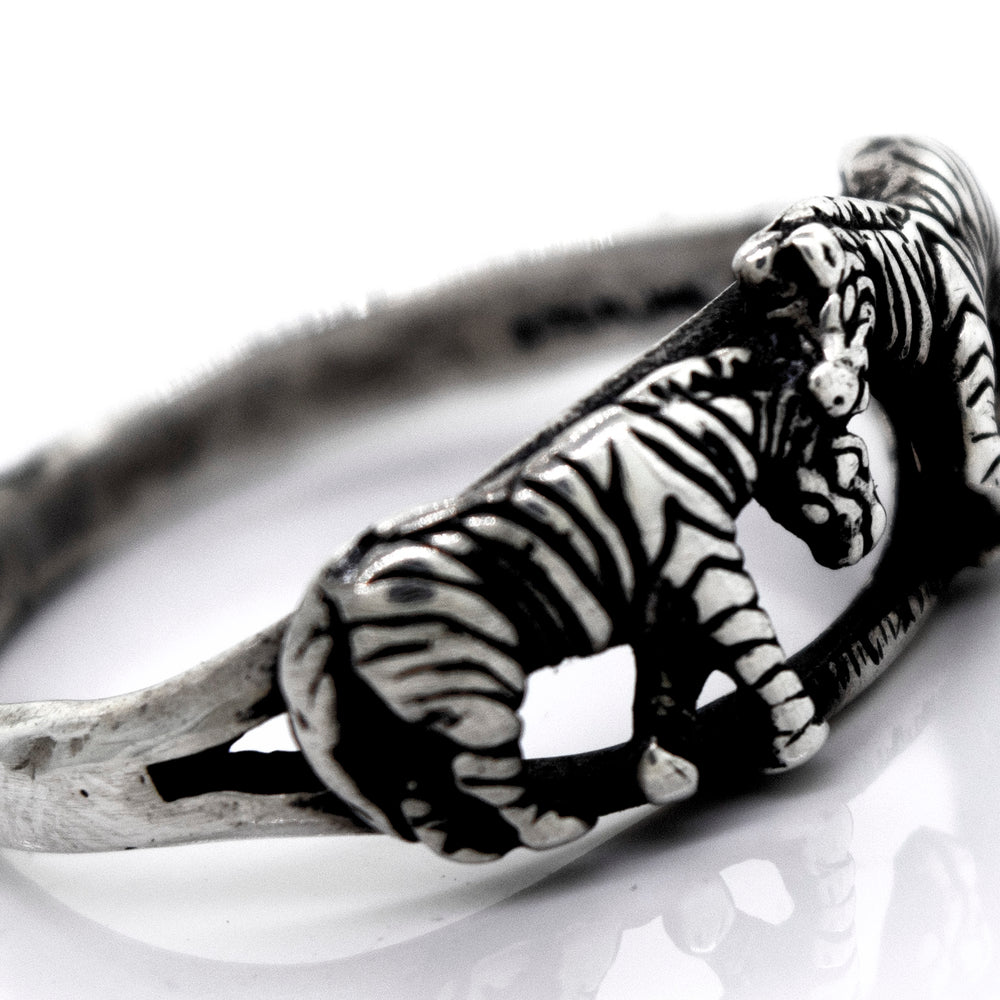 
                  
                    A Super Silver American Made Zebra Ring intricately handcrafted.
                  
                