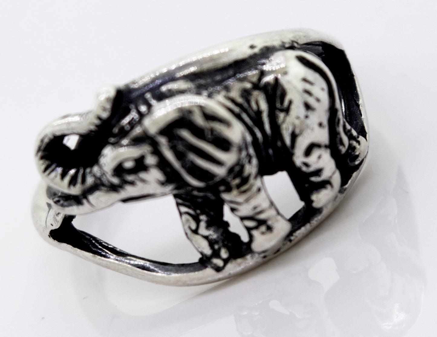 An American Made Elephant Ring on a white surface.