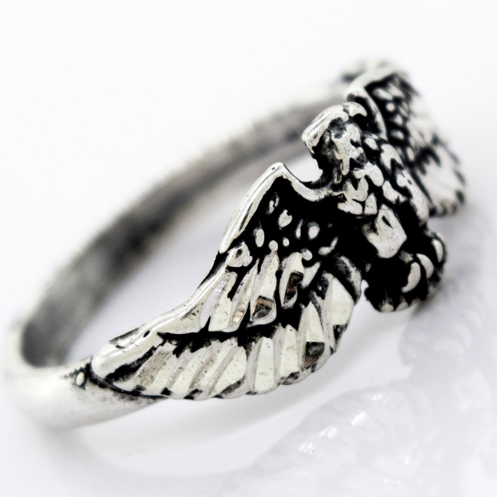
                  
                    A Super Silver American Made Eagle Ring with an eagle design.
                  
                