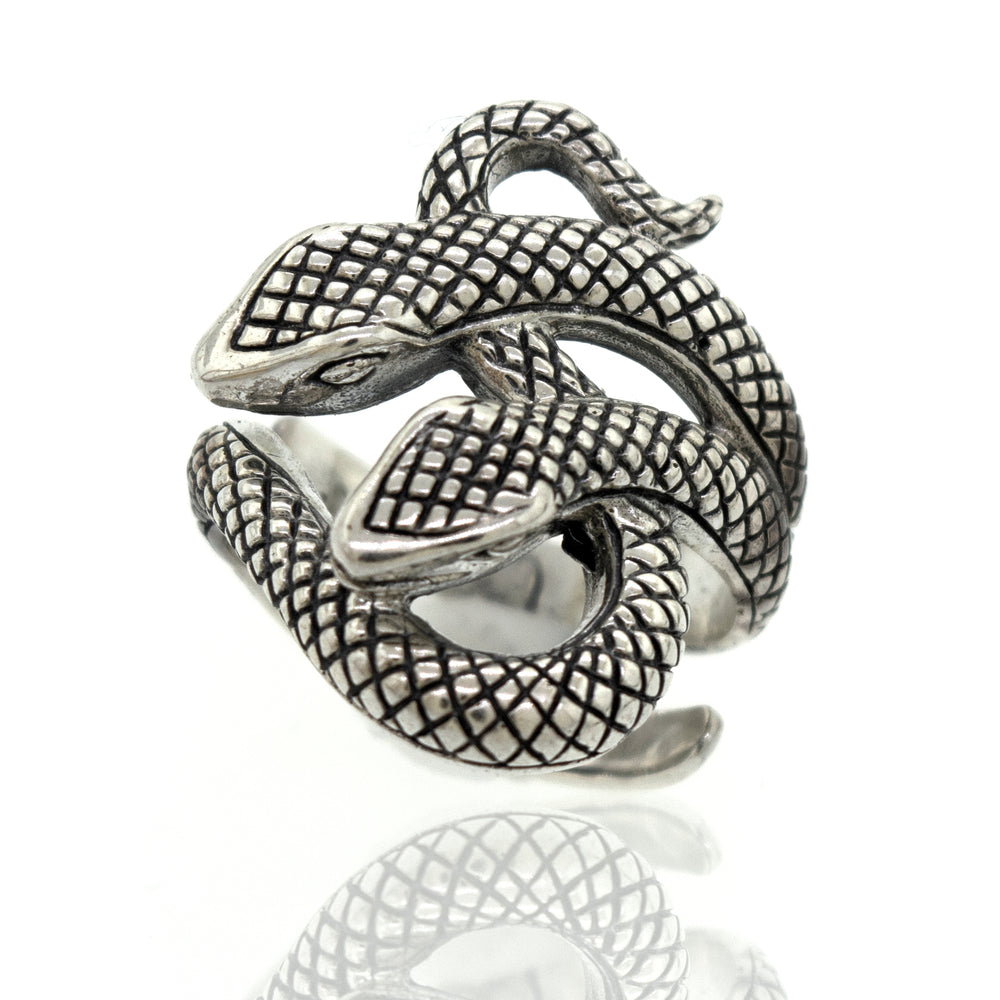 
                  
                    A handcrafted Super Silver Double Headed Snake Ring with two snakes.
                  
                