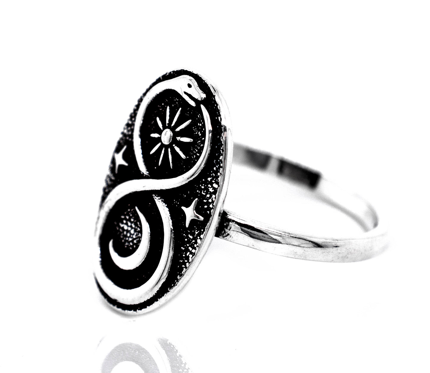 
                  
                    A Celestial Ouroboros Snake Ring from Super Silver, symbolizing ouroboros, illuminates the lunar setting.
                  
                
