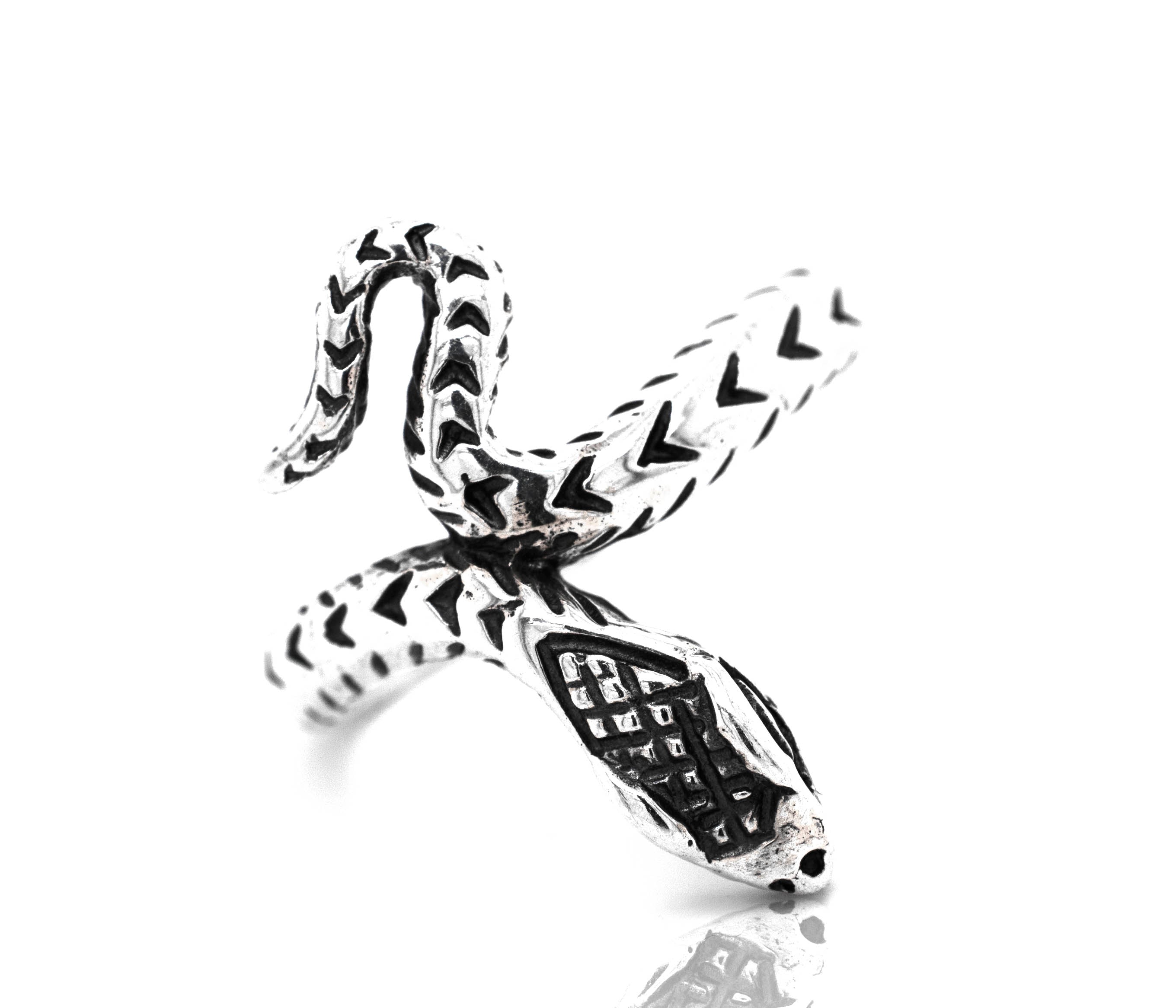 A captivating Super Silver snake ring with a diamond pattern on a white surface.