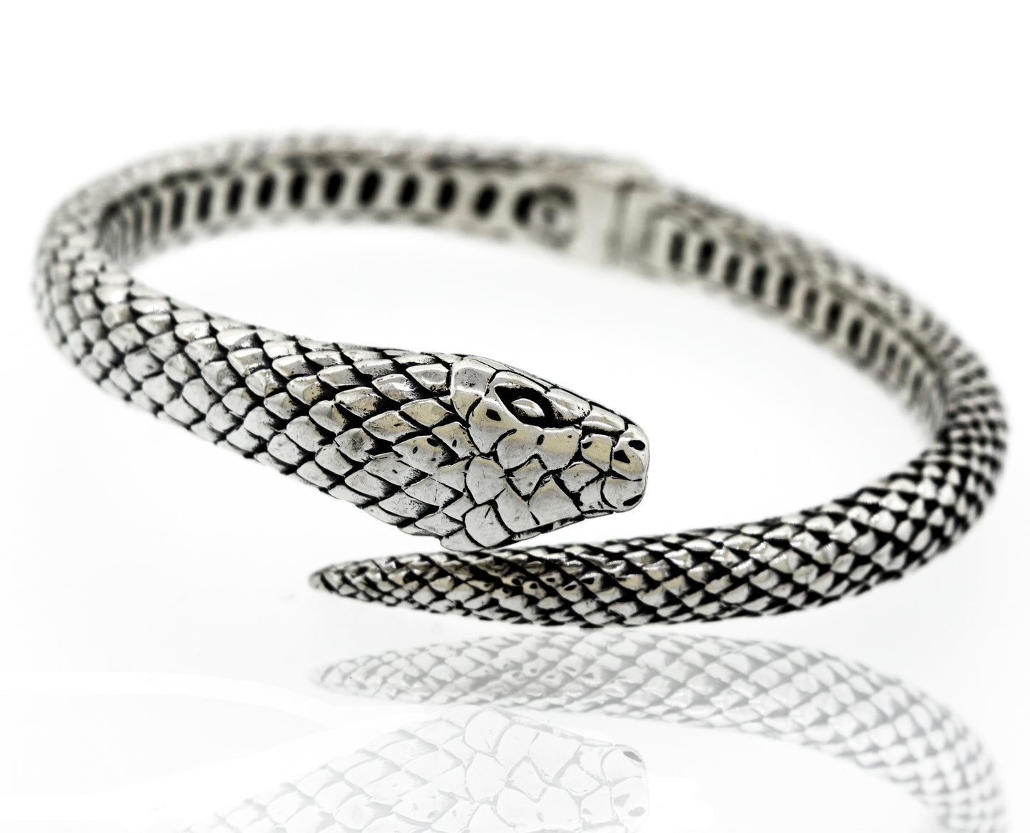 A stunning Enchanting Hinge Snake Bracelet from the Super Silver artisan collections, crafted with sterling silver, displayed elegantly on a white surface.