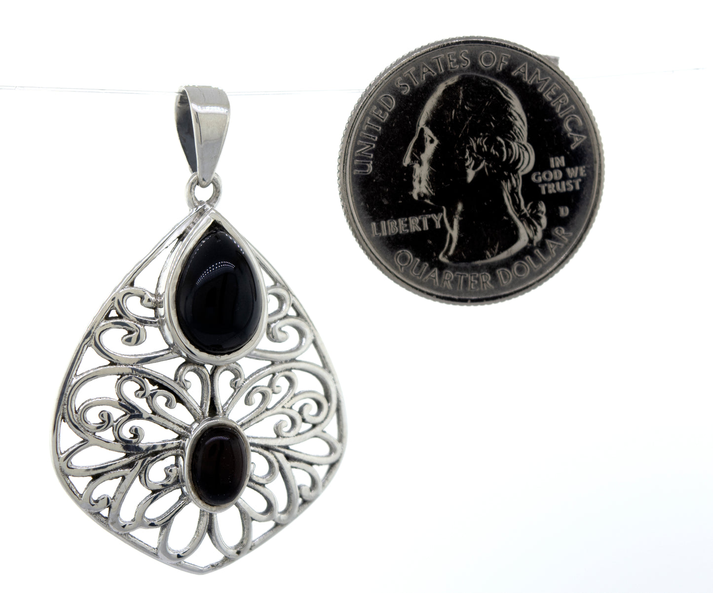 
                  
                    A Moonstone Pendant from Super Silver, featuring a black onyx stone.
                  
                