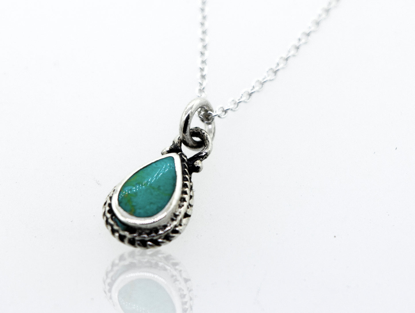 
                  
                    A lightweight Super Silver sterling silver Green Turquoise Teardrop Necklace.
                  
                