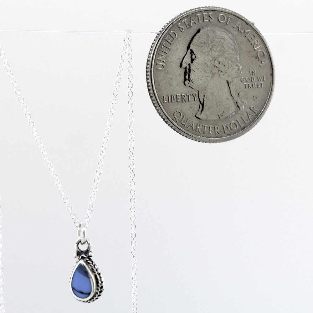 Super Silver's Mother of Pearl Teardrop Necklace on a silver chain.