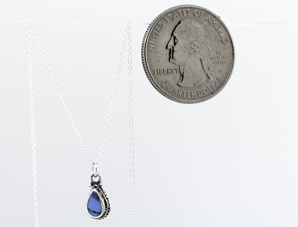 
                  
                    Super Silver's Mother of Pearl Teardrop Necklace on a silver chain.
                  
                