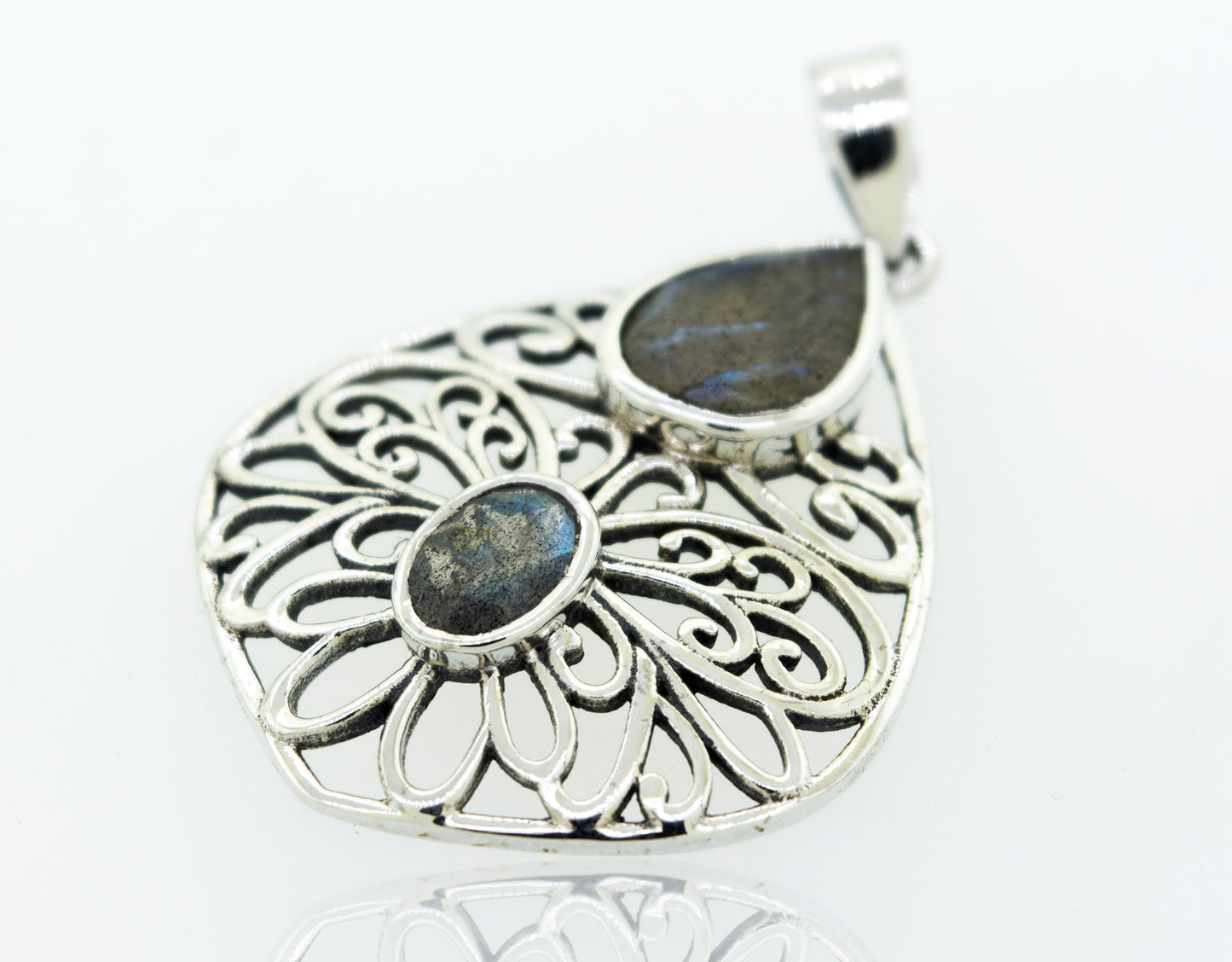 
                  
                    Super Silver Labradorite pendant with sterling silver filigree setting.
                  
                