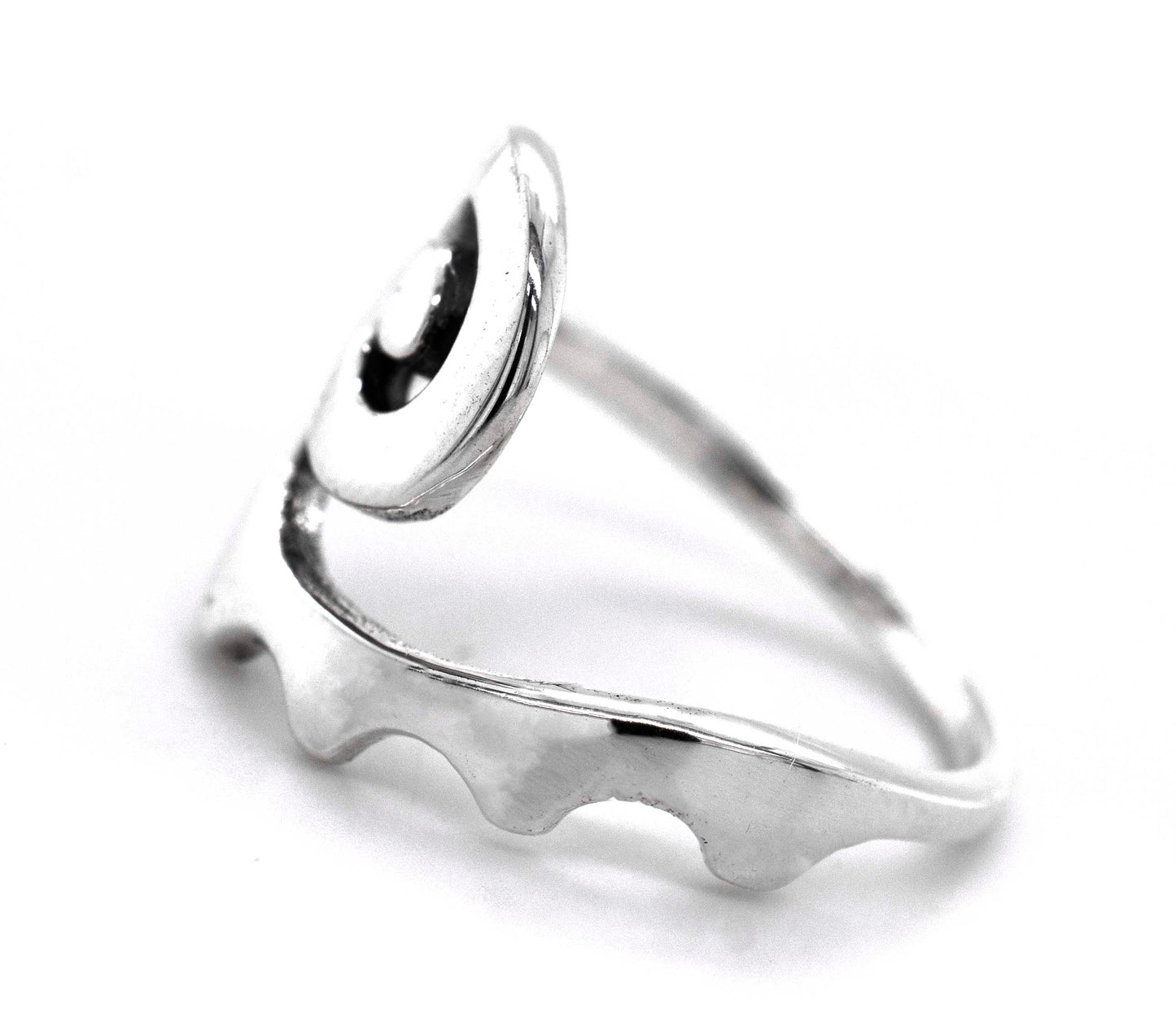 
                  
                    A freestyle sterling silver Spiral Design Ring with an abstract wave design.
                  
                