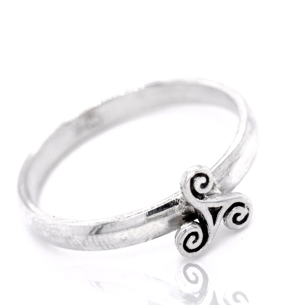 
                  
                    A Dainty Triskelion Ring with a Celtic swirl design.
                  
                