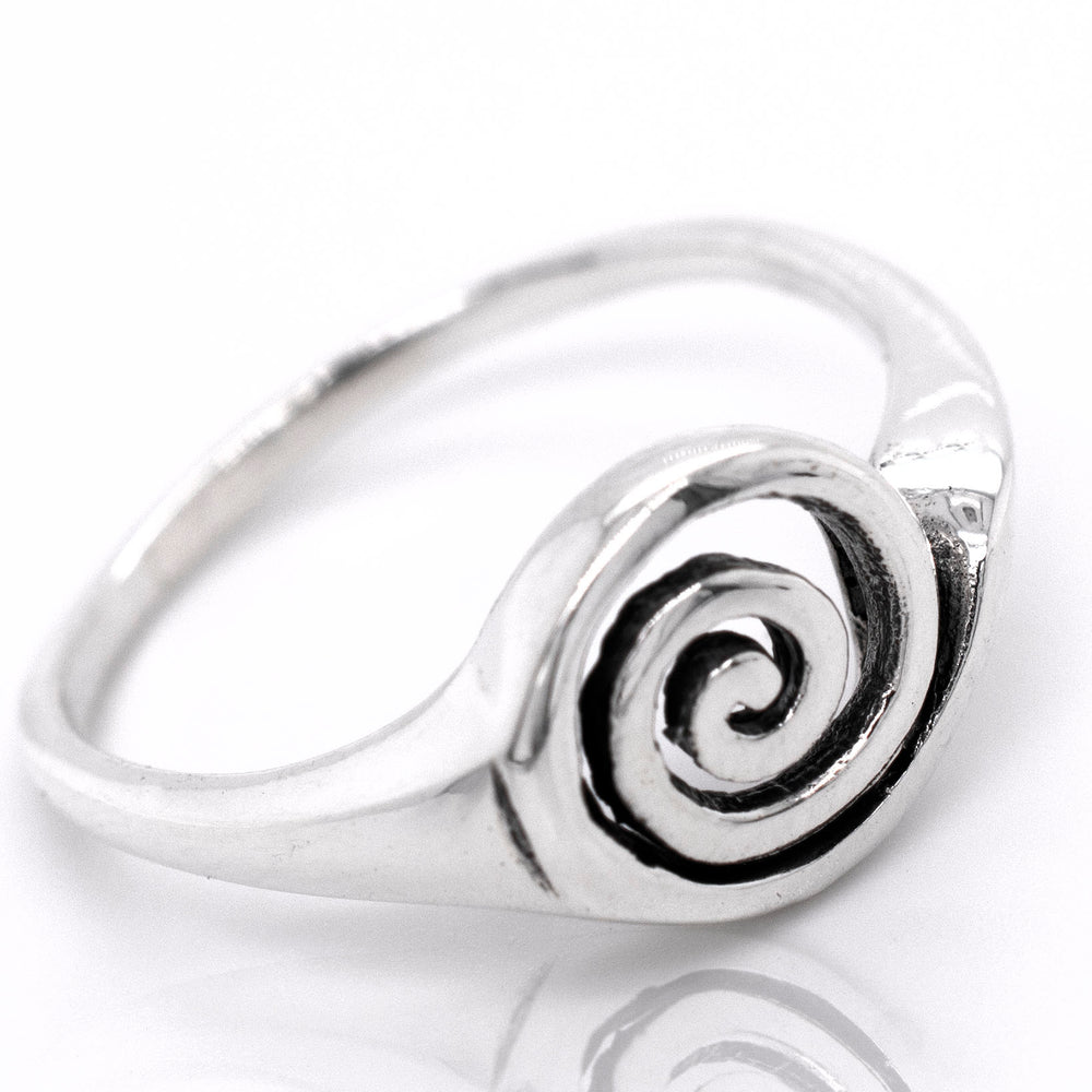 
                  
                    A silver Simple Spiral Ring with a freeform swirl design.
                  
                