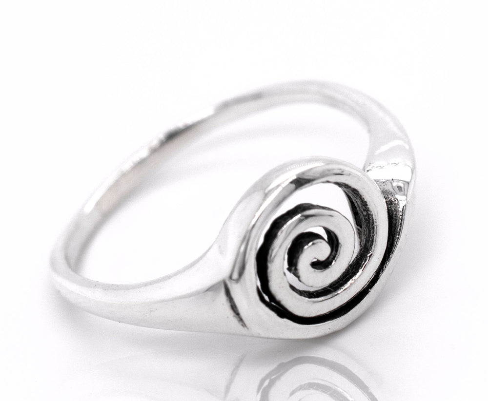 A silver Simple Spiral Ring with a freeform swirl design.