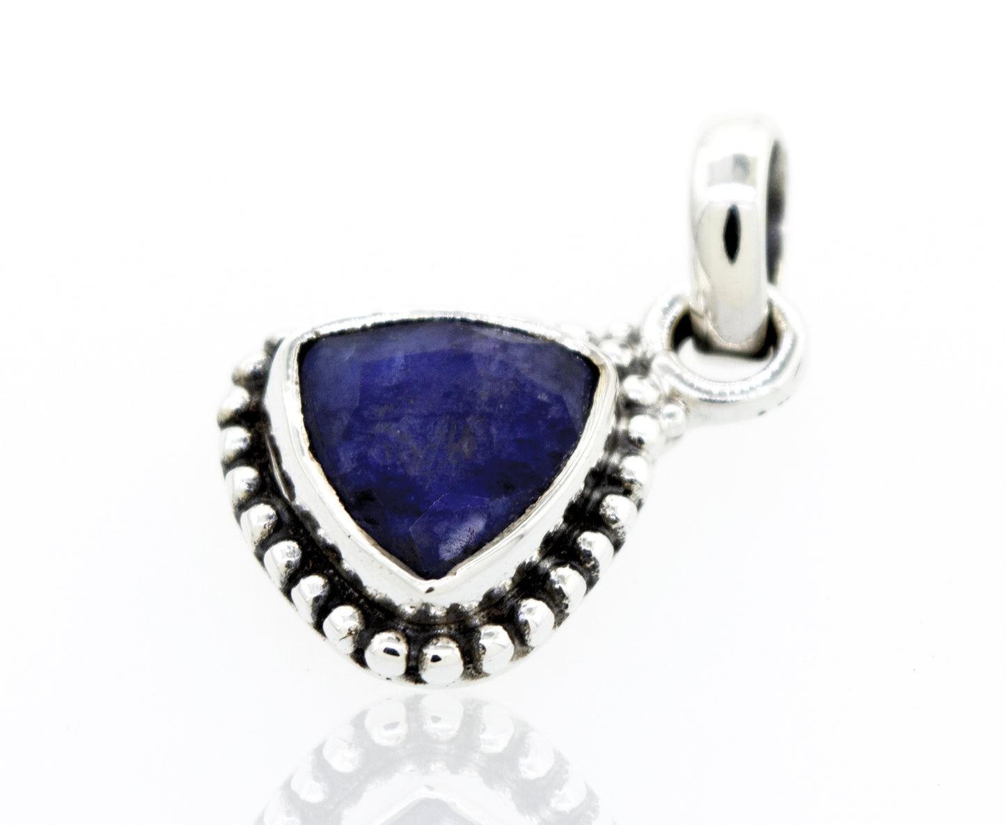 A Beautiful Triangular Shape Sapphire Pendant With Beads Design by Super Silver, with a lapis stone in a silver setting.