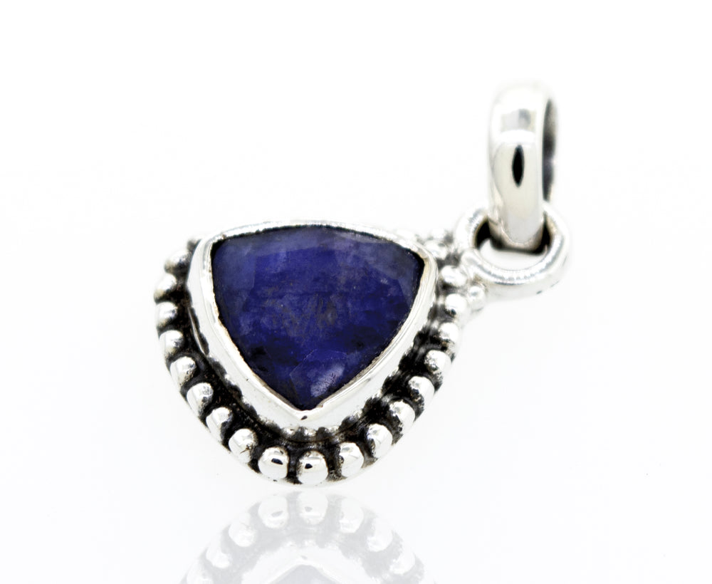 
                  
                    Beautiful Triangular Shape Sapphire Pendant With Beads Design
                  
                