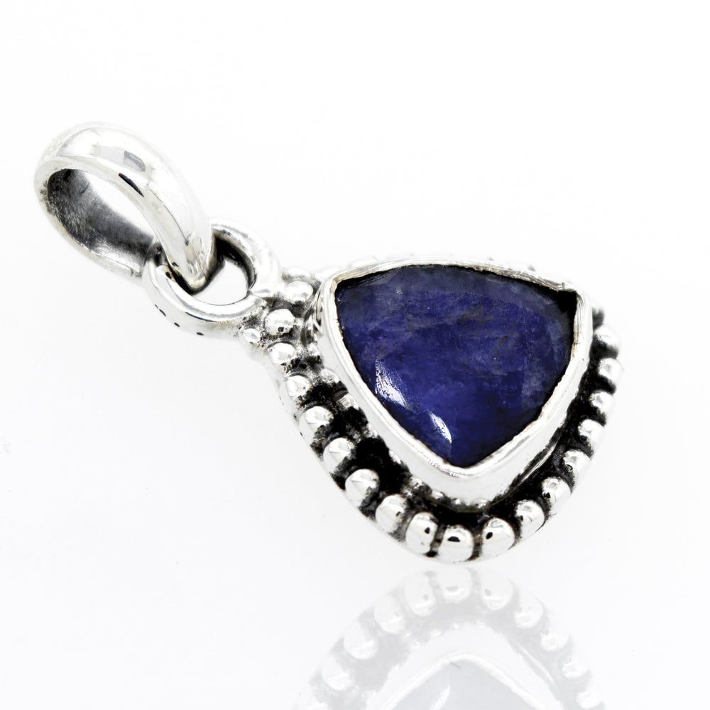 A Beautiful Triangular Shape Sapphire Pendant With Beads Design from Super Silver, with a lapis stone and a silver setting.