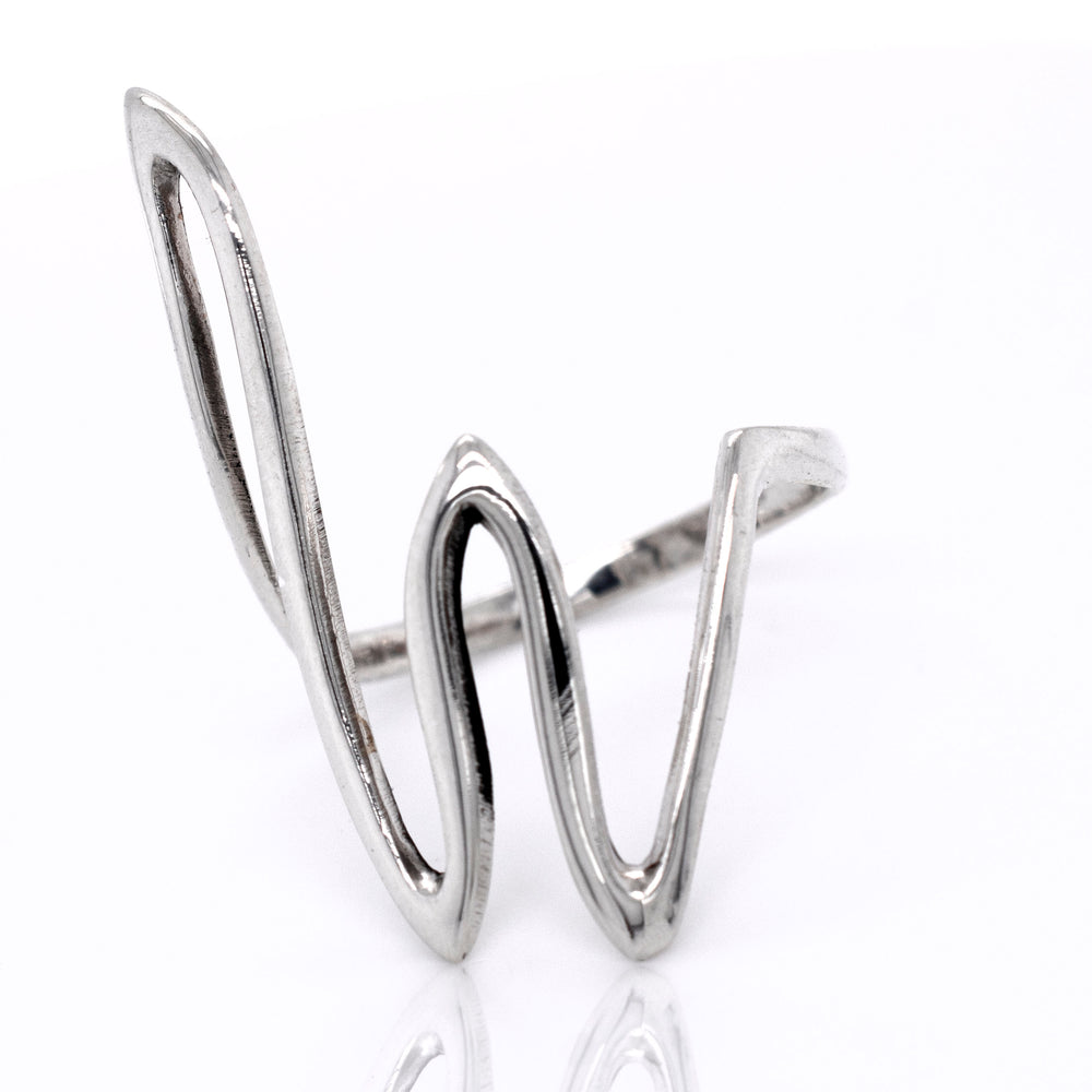
                  
                    A simple Large Squiggle Pattern Ring with the letter W on it, perfect for stacking on your finger, made by Super Silver.
                  
                