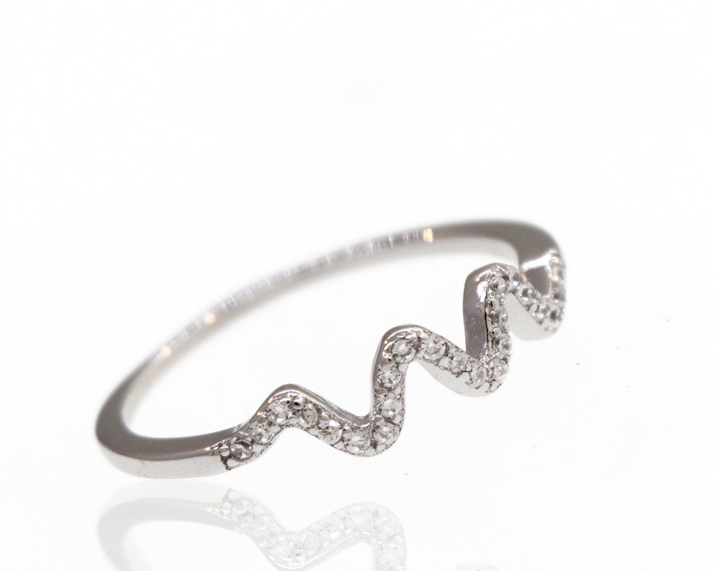 An elegant Wavy Pave Band engagement ring with diamonds on it.