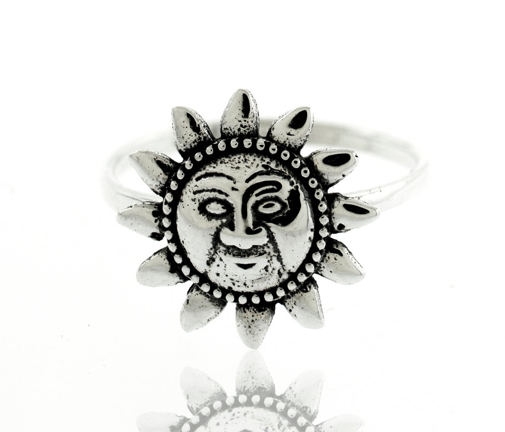 A minimalist-style Super Silver silver sun with face ring, oxidized for a stunning effect.