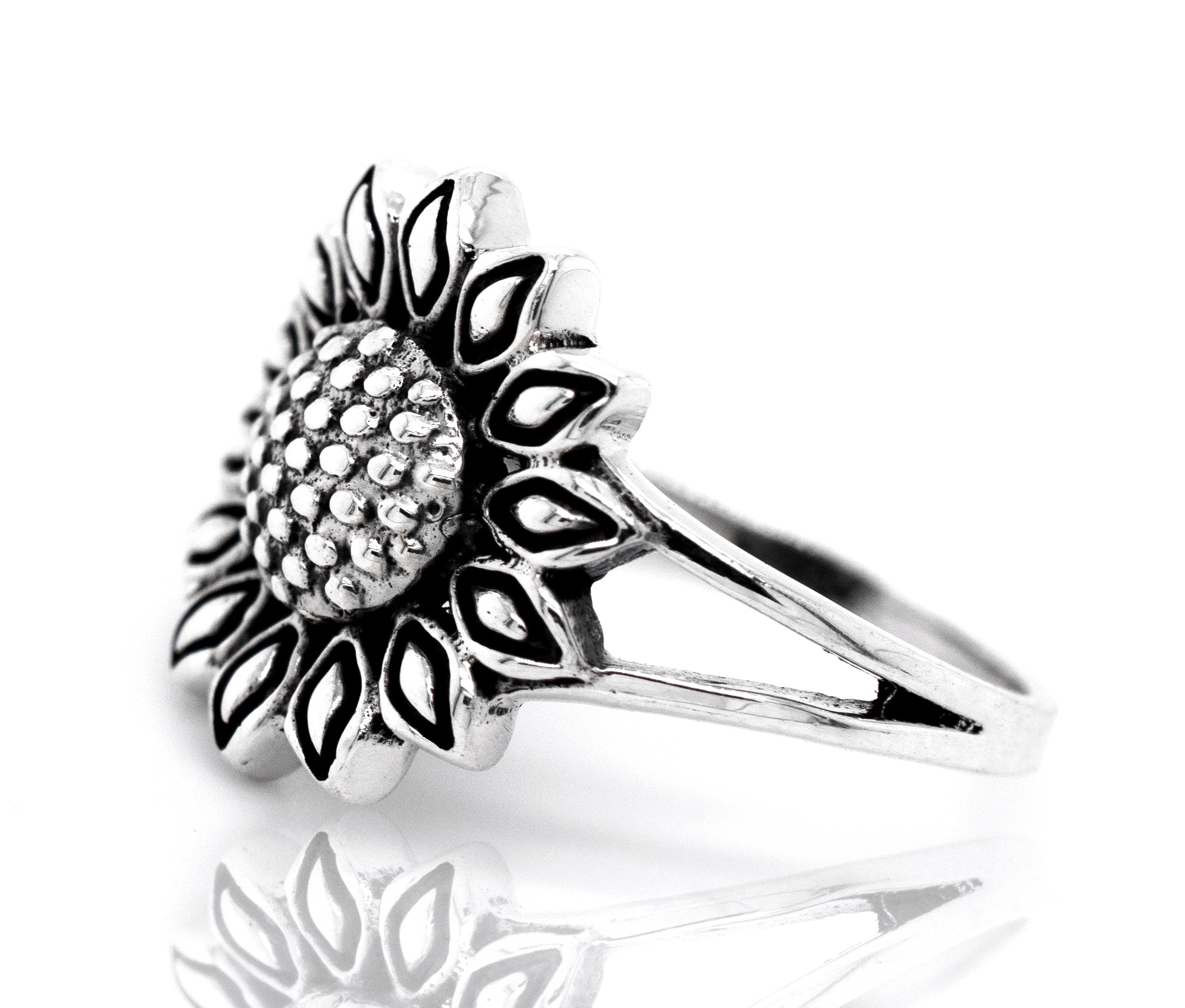 A sterling silver Sunflower Ring on a white background.