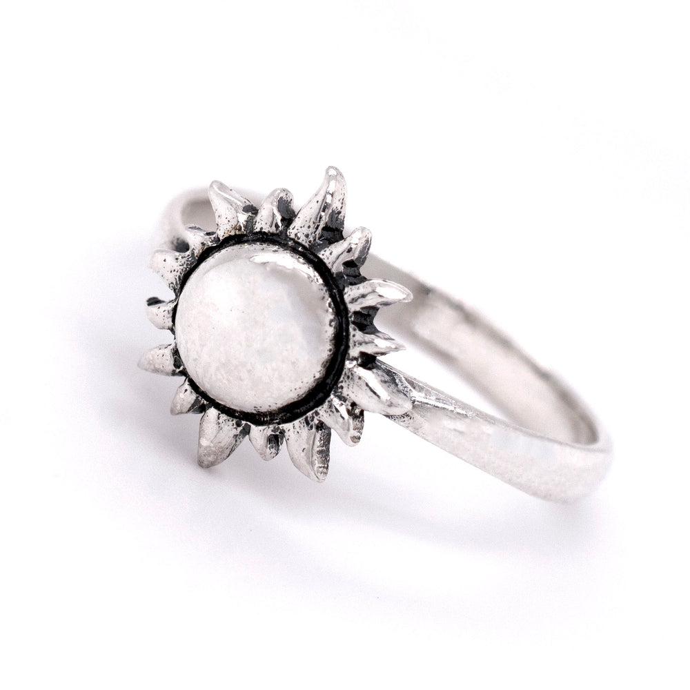 
                  
                    A minimalist style Super Silver Sun Ring with a white stone, made of sterling silver.
                  
                