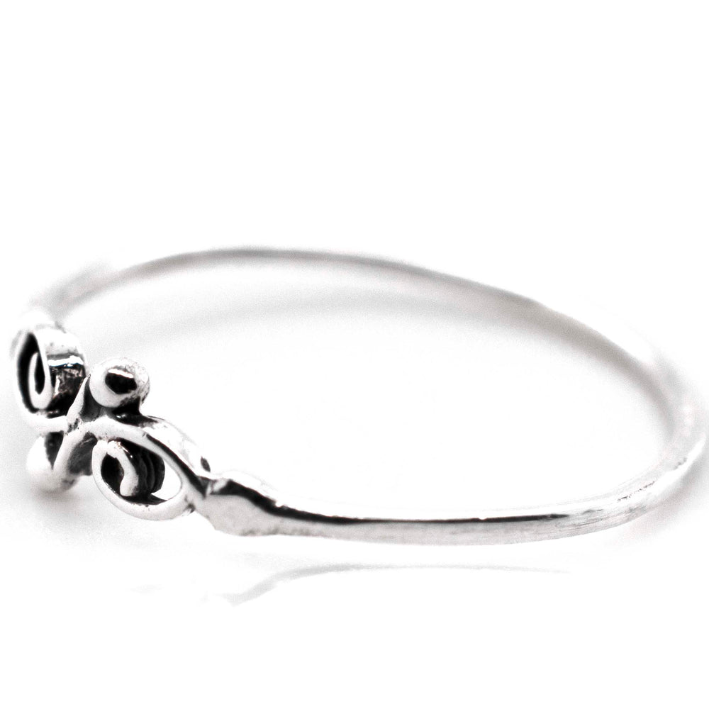A Super Silver Dainty Filigree Ring with an ornate swirl filigree design, perfect for day-to-day wear or stacking.