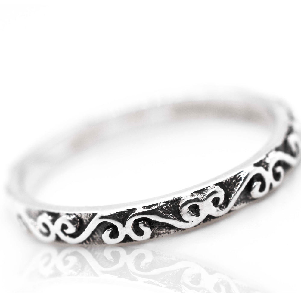 
                  
                    A Simple Band With Swirl Design by Super Silver.
                  
                