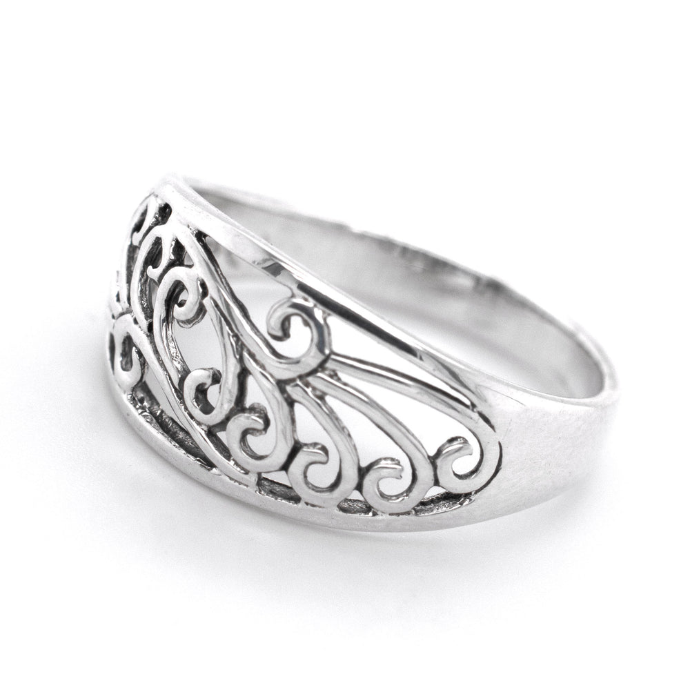 
                  
                    An art nouveau-styled Sweeping Domed Filigree Ring from Super Silver, showcasing artful extravagance.
                  
                