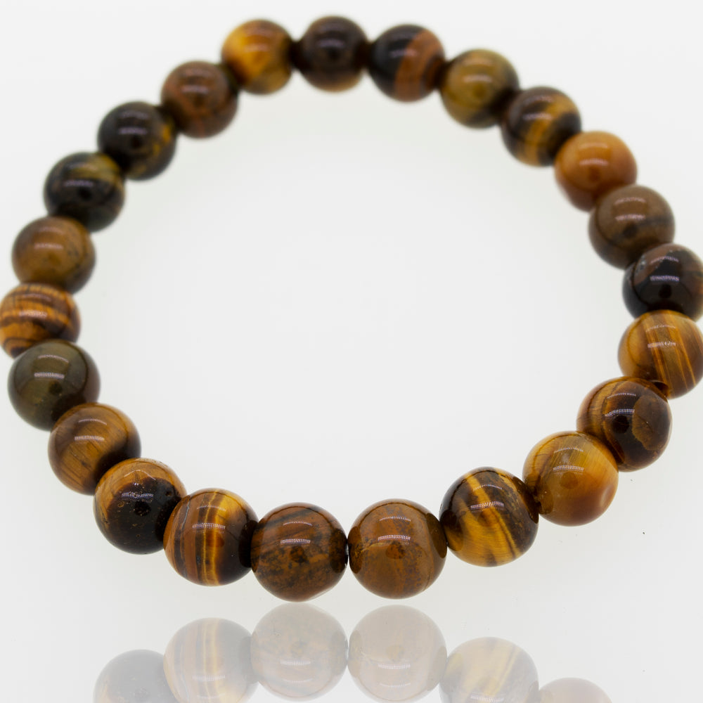 
                  
                    A Super Silver Beaded Stone Bracelet adorned with tiger eye gemstone beads.
                  
                