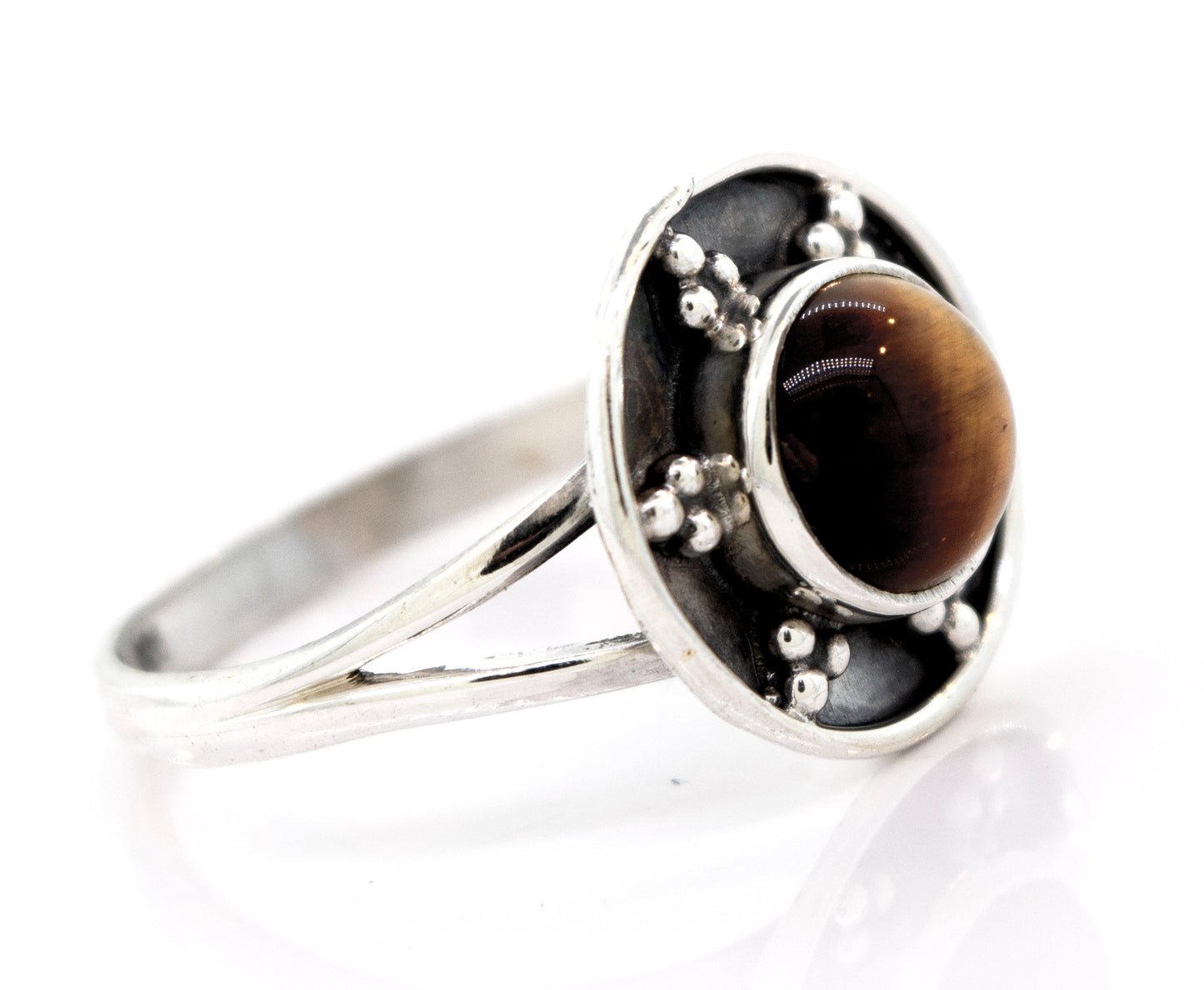 A Super Silver Tiger's Eye Ring With Unique Oxidized Silver Design featuring a mesmerizing tiger's eye stone.