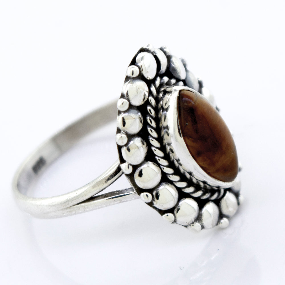
                  
                    A beautiful Super Silver Marquise Shaped Vibrant Tiger's Eye Ring.
                  
                