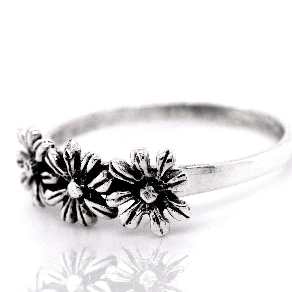 Dainty Three Flowers Design Ring with a floral design.