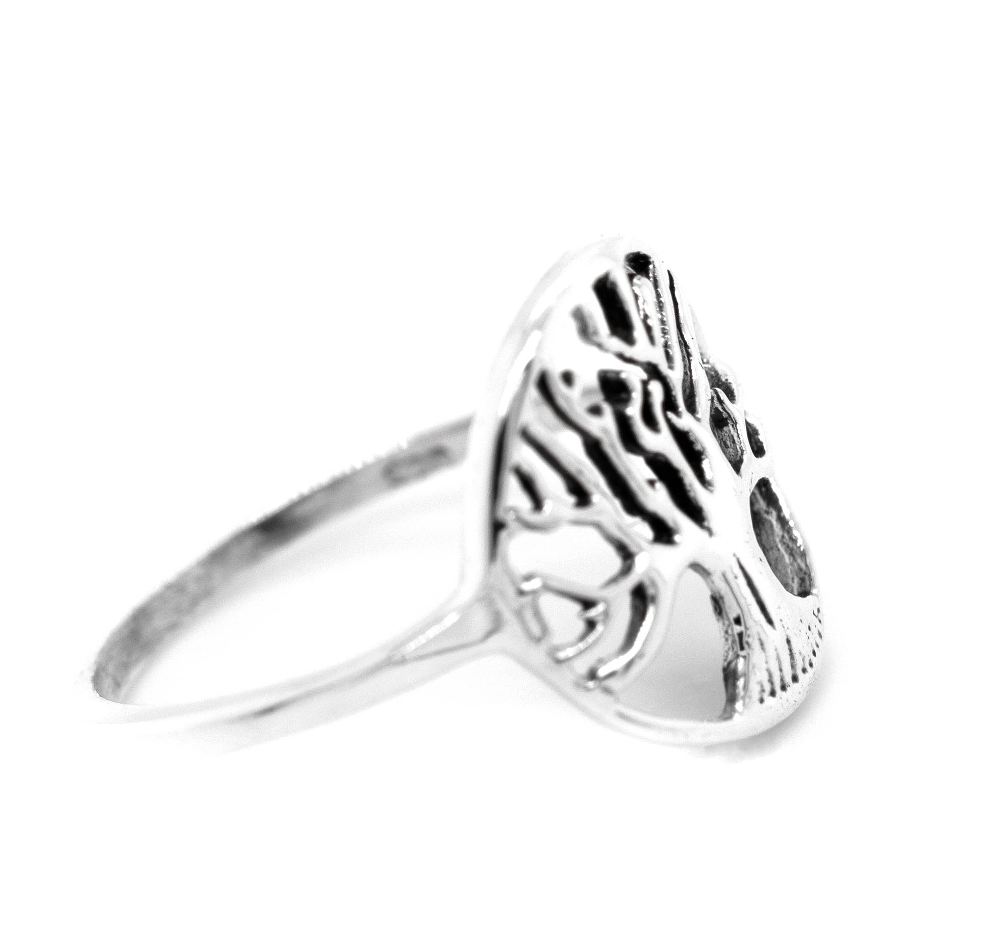 A sterling silver Tree Of Life Ring adorned with a tree of life design.
