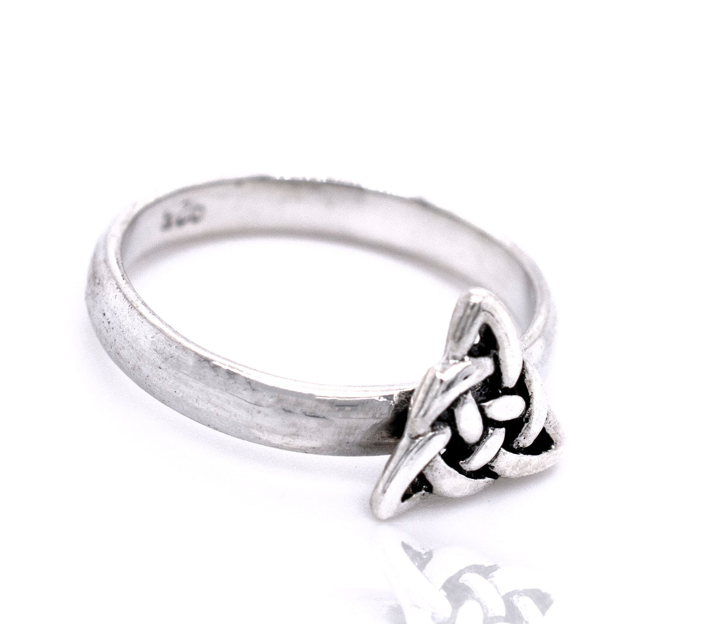 
                  
                    A Dainty Celtic Triangle Ring with a Celtic knot on it.
                  
                