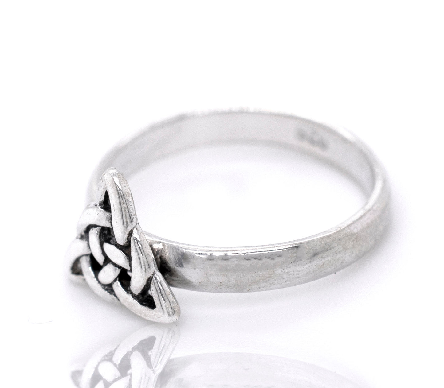 
                  
                    A sterling silver ring with a Dainty Celtic Triangle Ring design.
                  
                