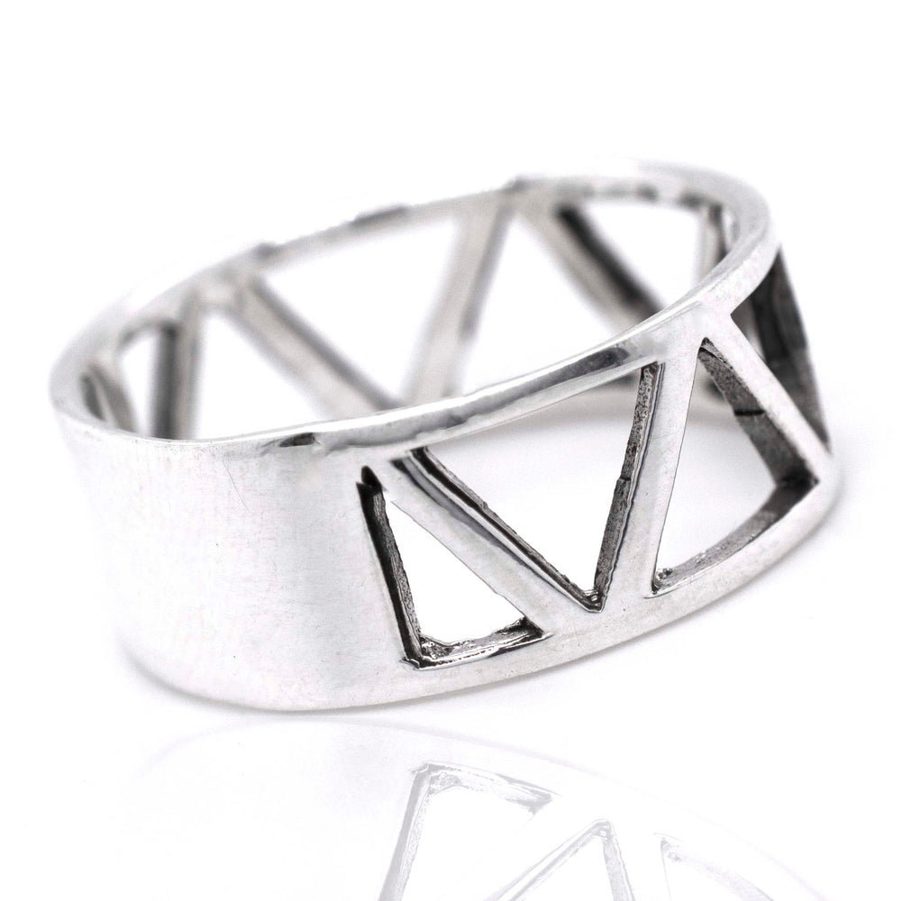 
                  
                    An everyday wear Wide Band With Cutout Triangle Design sterling silver ring by Super Silver.
                  
                