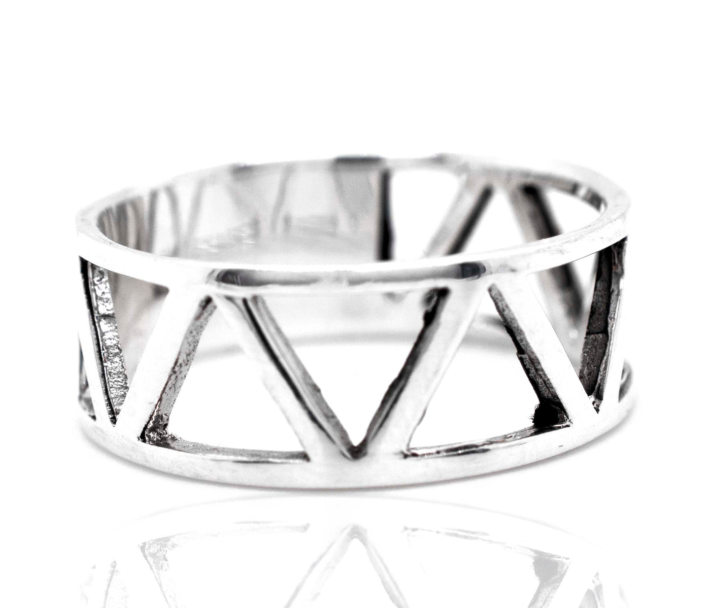 
                  
                    An everyday wear Super Silver ring with cutout triangles on a Wide Band With Cutout Triangle Design.
                  
                