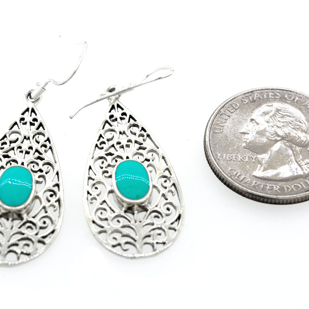 
                  
                    A pair of Super Silver Elegant Teardrop Shape Turquoise Earrings.
                  
                